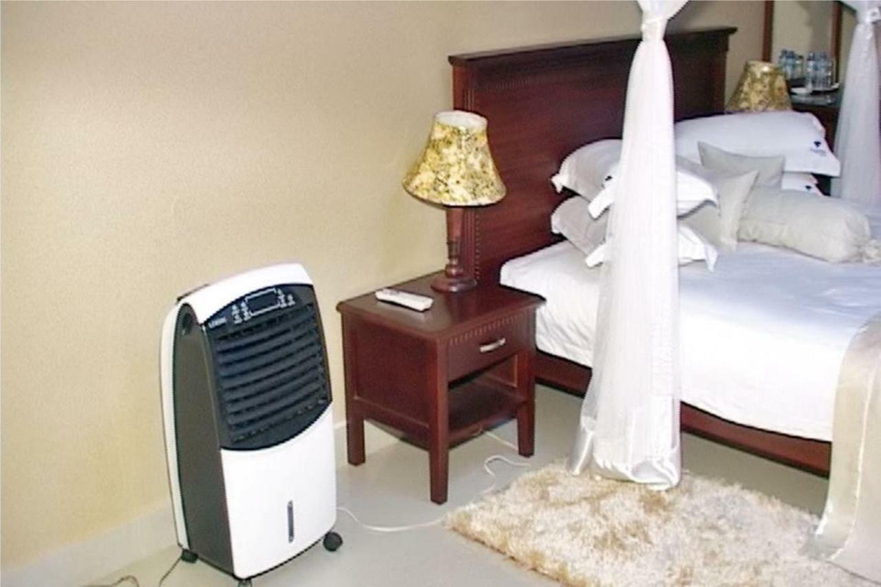 Sapphire Hotel Entebbe Kigo Kajansi Экстерьер фото
